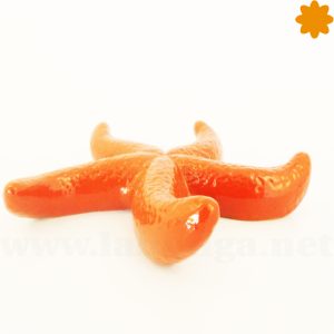 Estrella de mar realizada en cerámica de color rojo